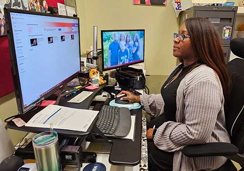 Nicole Mings at her desk